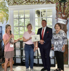 Grand Prize presented to Connie Hessler by Mayor John Gunter, Councilmember Gloria Tate and Cheryl Anderson